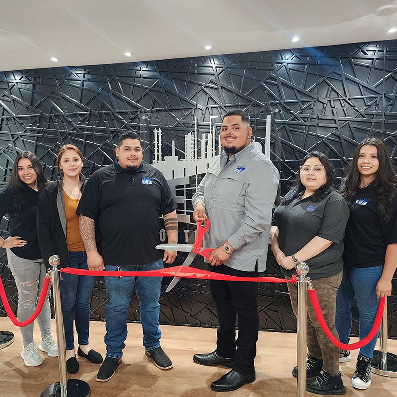 Team Cutting Ribbon